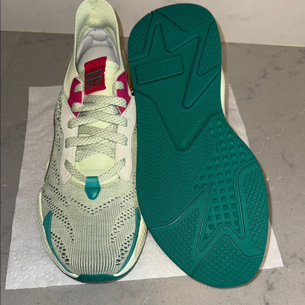 Brand new. Puma Sneakers with Green and Pink Highlights- brand new never worn